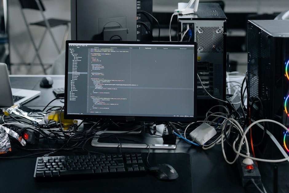 A computer screen displaying a dark-themed code editor with visible HTML source code. The code includes tags such as <!DOCTYPE html>, <html>, <head>, and <body>, with syntax highlighted in various col
